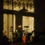 A glowing smartphone screen on an empty unmade bed at night, symbolizing the digital ghost and social media haunting after a friendship breakup.