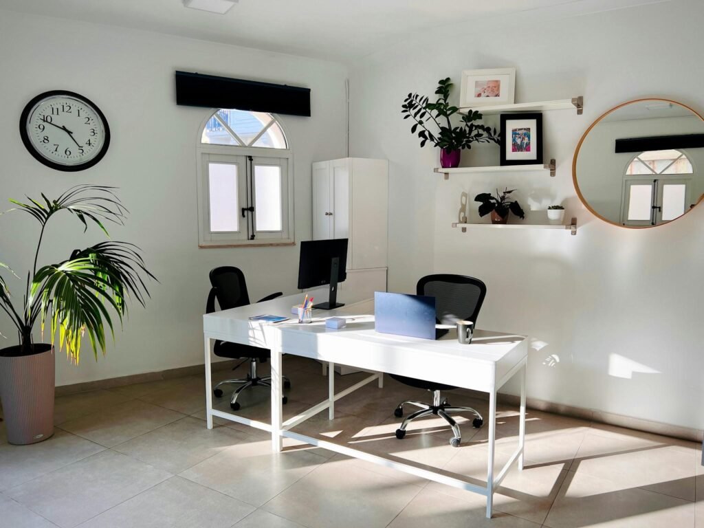 "A bright, minimalist modern office representing a successful digital personal brand and career authority.”
