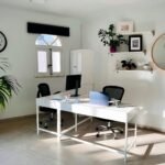 "A bright, minimalist modern office representing a successful digital personal brand and career authority.”