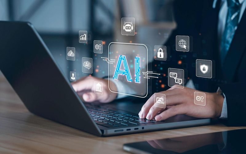 : "A professional using an AI-powered dashboard to automate and manage their job search strategy.”